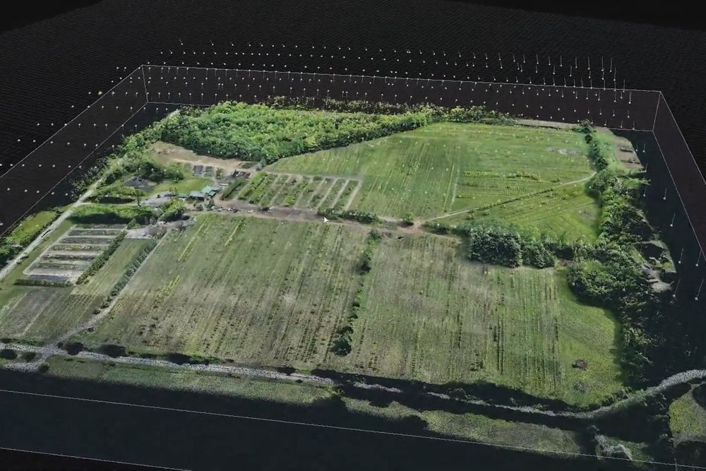 Drone photogrammetry model of a farm property and the terrain around it