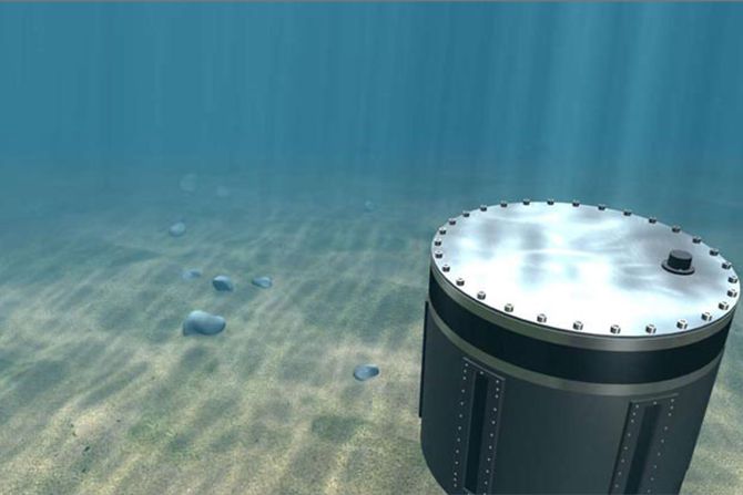 3D render of a cylindrical sonar unit resting on the sea floor in clear green-blue water, underwater caustics playing across its lid