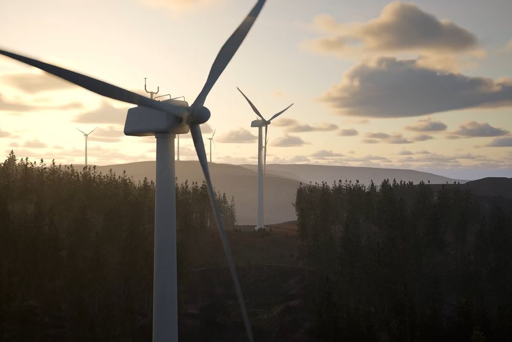 Proposed wind turbine on a forested ridge at sunset, with more turbines behind it